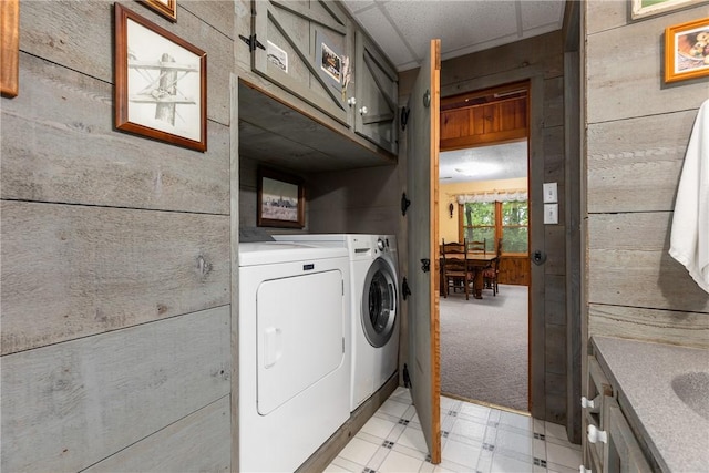 14915 N 8th Ave, Effingham, IL 62401 - laundry area with separate washer and dryer, wood walls, light floors, cabinet space, and light colored carpet