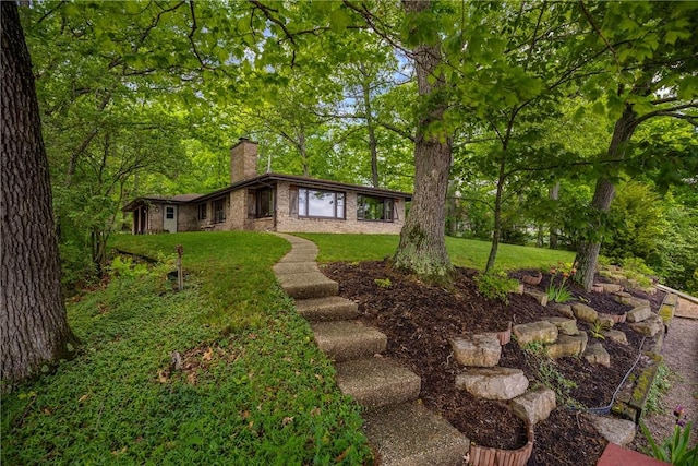 14915 N 8th Ave, Effingham, IL 62401 - view of front facade featuring a chimney and a front yard