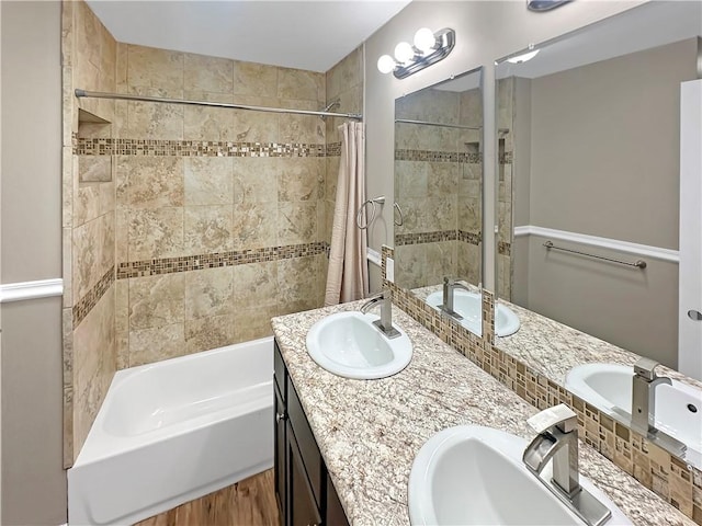 bathroom with double vanity and a sink