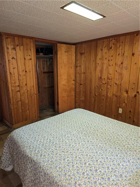 9 Orchard Dr, Charleston, IL 61920 - bedroom with wood walls
