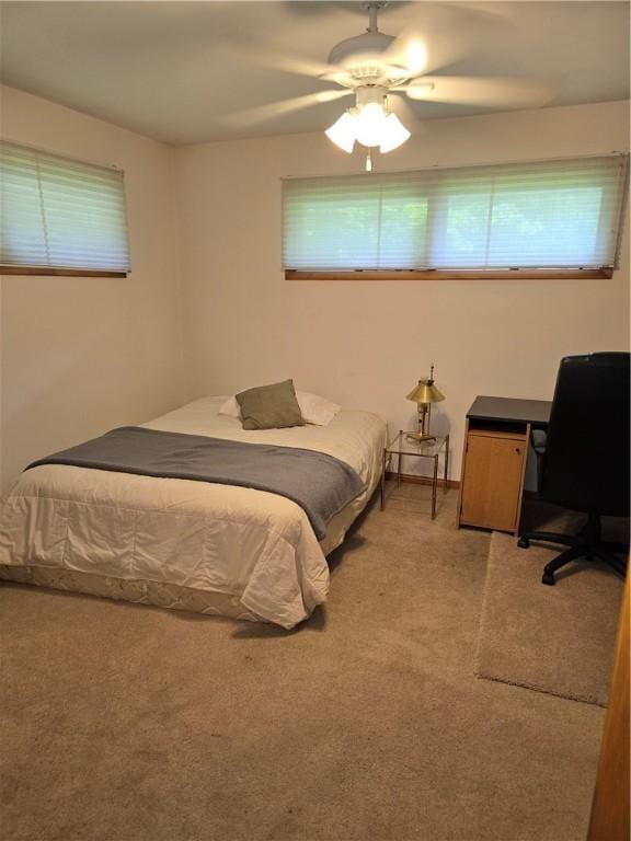9 Orchard Dr, Charleston, IL 61920 - bedroom featuring light carpet, ceiling fan, and an office area