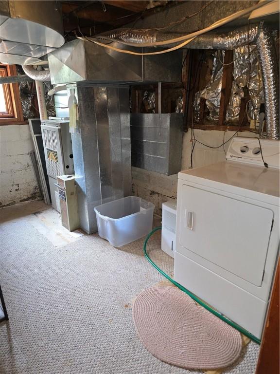 9 Orchard Dr, Charleston, IL 61920 - below grade area featuring washer / dryer