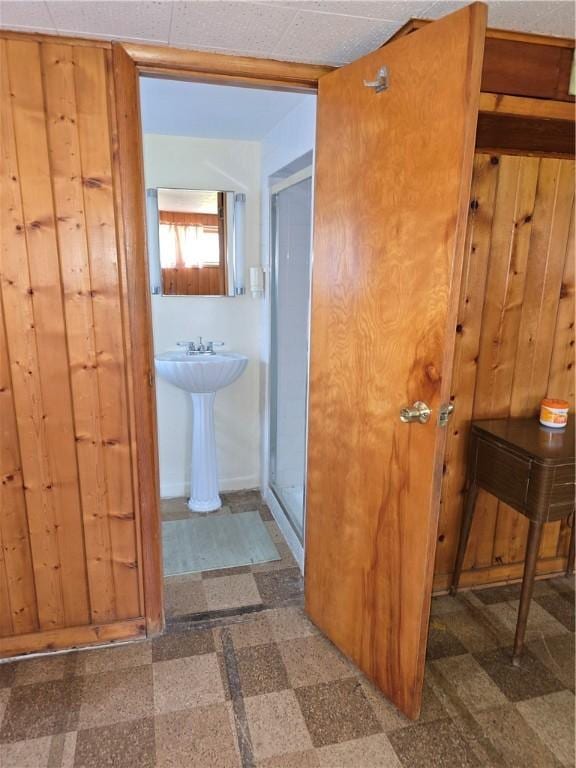 9 Orchard Dr, Charleston, IL 61920 - bathroom with a shower stall, tile patterned floors, and baseboards