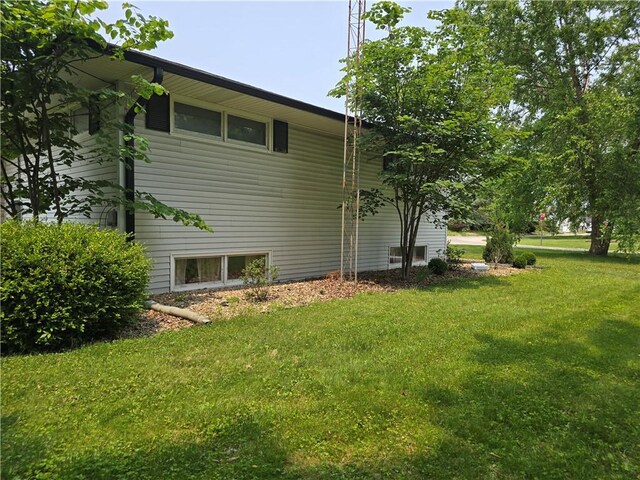 9 Orchard Dr, Charleston, IL 61920 - view of property exterior featuring a yard