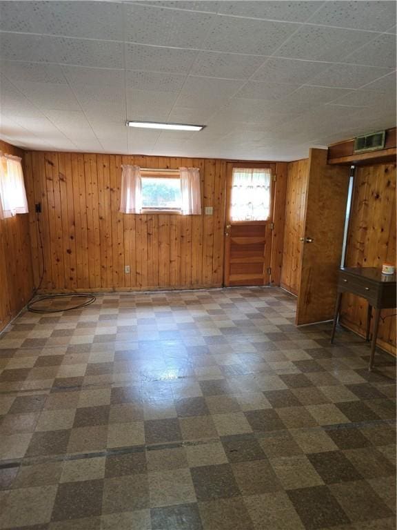 9 Orchard Dr, Charleston, IL 61920 - basement featuring wood walls and dark floors