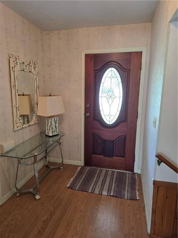 9 Orchard Dr, Charleston, IL 61920 - foyer with wood finished floors, wallpapered walls, and baseboards