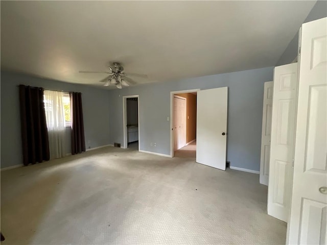 1408 Hickory Hill Dr, Effingham, IL 62401 - unfurnished bedroom featuring baseboards, light colored carpet, and a ceiling fan
