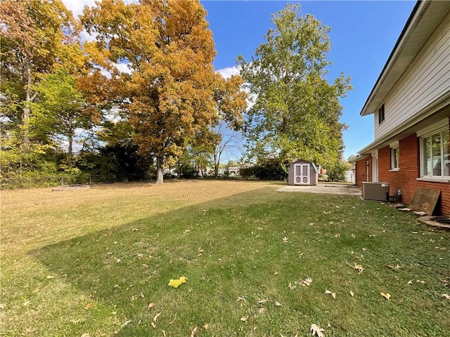 1408 Hickory Hill Dr, Effingham, IL 62401 - view of green lawn featuring central AC unit