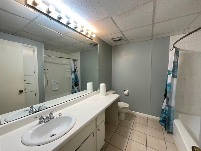 1408 Hickory Hill Dr, Effingham, IL 62401 - full bath with vanity, a paneled ceiling, toilet, tile patterned flooring, and shower / bath combo