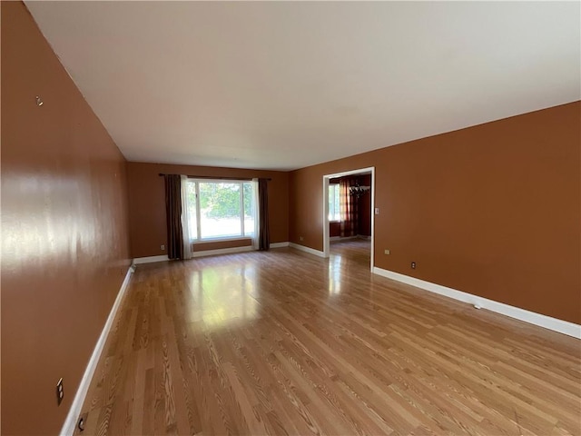 1408 Hickory Hill Dr, Effingham, IL 62401 - unfurnished room featuring light wood finished floors and baseboards