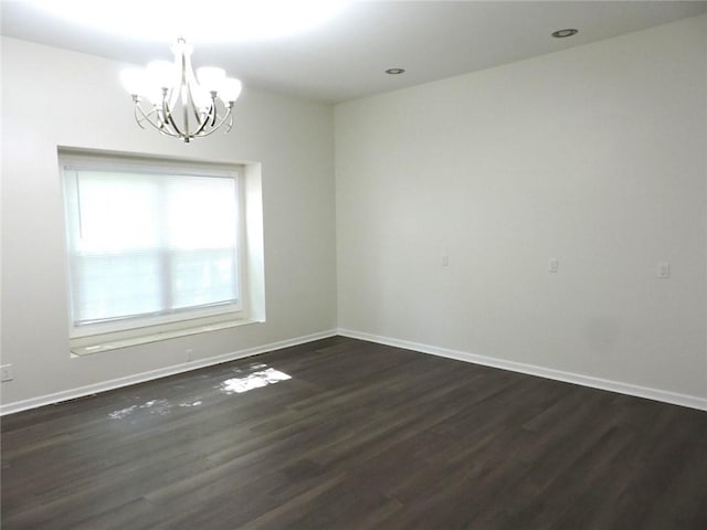 37626 Hunnington Ridge Rd, Hoopeston, IL 60942 - unfurnished room with a chandelier and dark wood-style flooring