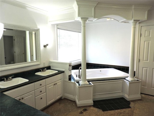 37626 Hunnington Ridge Rd, Hoopeston, IL 60942 - bathroom featuring ornate columns, a bath, double vanity, crown molding, and tile patterned floors
