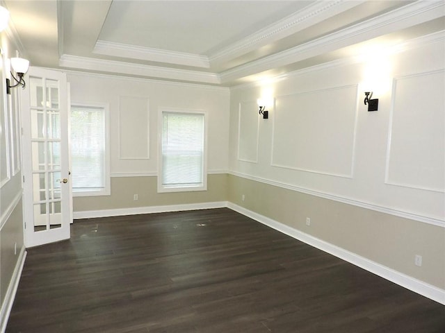 37626 Hunnington Ridge Rd, Hoopeston, IL 60942 - spare room featuring a tray ceiling, dark wood-style flooring, ornamental molding, and french doors