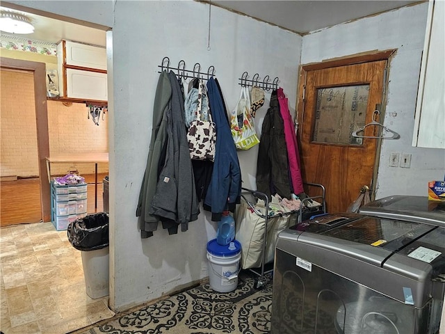 laundry room featuring separate washer and dryer