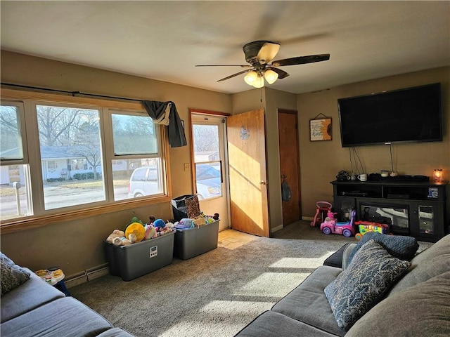 living room featuring light colored carpet and ceiling fan