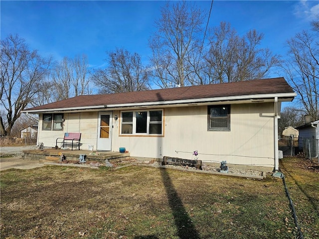 view of front of house featuring a patio area and a front yard