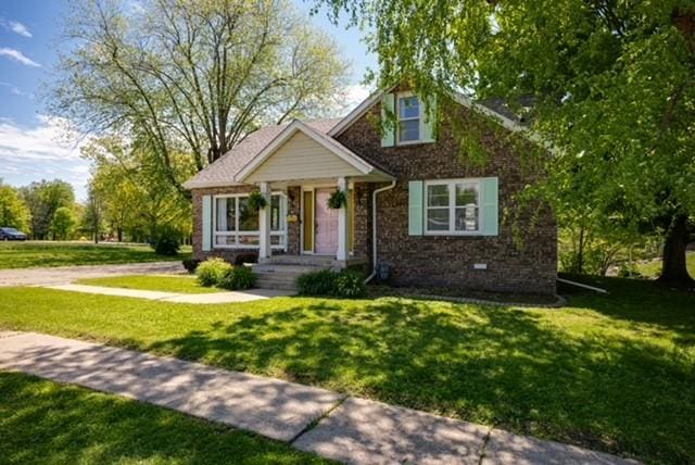 bungalow with a front yard