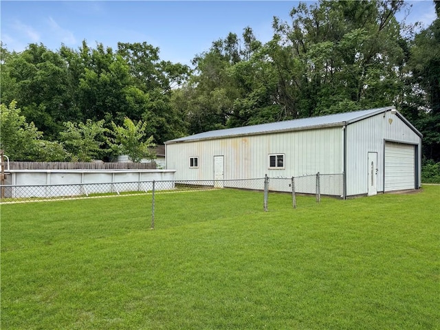 2421 Charleston Ave, Mattoon, IL 61938 - view of yard featuring an outdoor structure and a garage