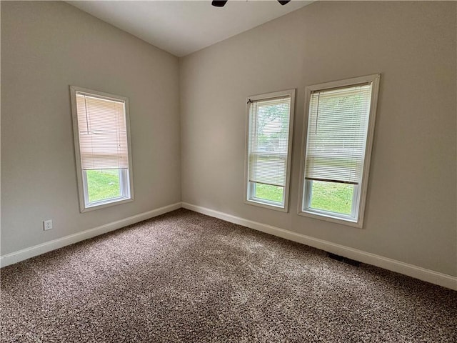 2421 Charleston Ave, Mattoon, IL 61938 - empty room featuring carpet flooring and ceiling fan