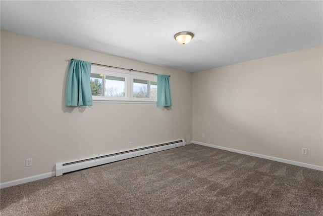 33 Homestead Dr, Newton, IL 62448 - unfurnished room featuring a baseboard heating unit, carpet floors, a textured ceiling, and baseboards