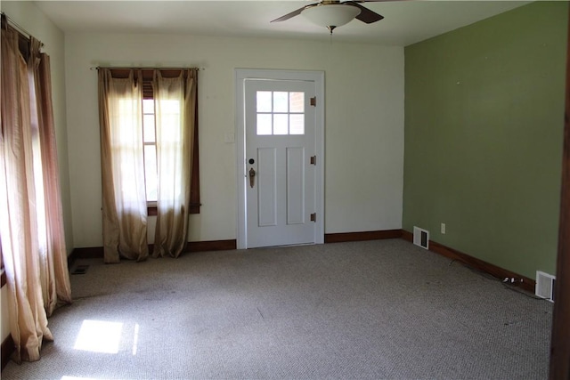 707 W N 2nd St, Shelbyville, IL 62565 - carpeted foyer entrance featuring ceiling fan and baseboards
