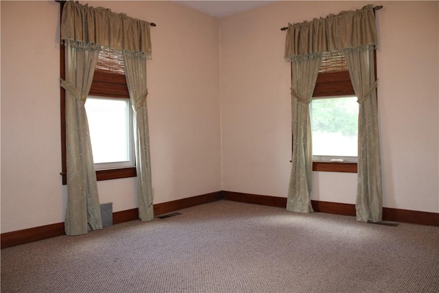 707 W N 2nd St, Shelbyville, IL 62565 - carpeted empty room featuring healthy amount of natural light and baseboards