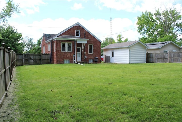 707 W N 2nd St, Shelbyville, IL 62565 - rear view of property with brick siding