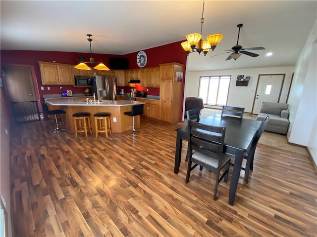 dining room with a chandelier and wood finished floors