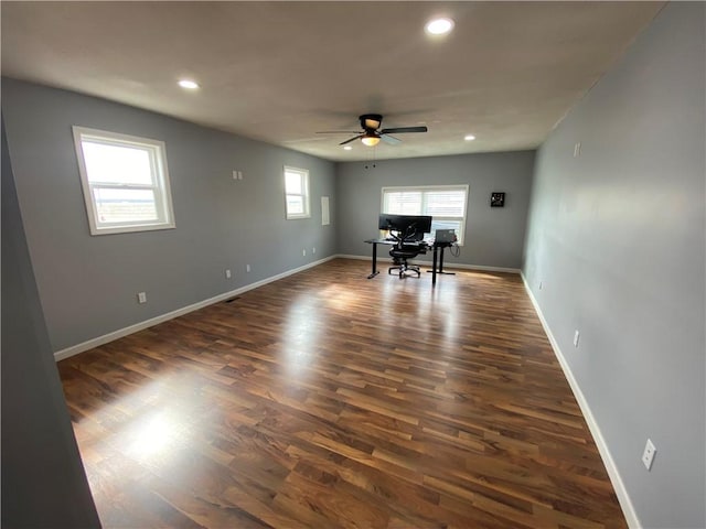 unfurnished room featuring dark wood-style floors, baseboards, a ceiling fan, and recessed lighting