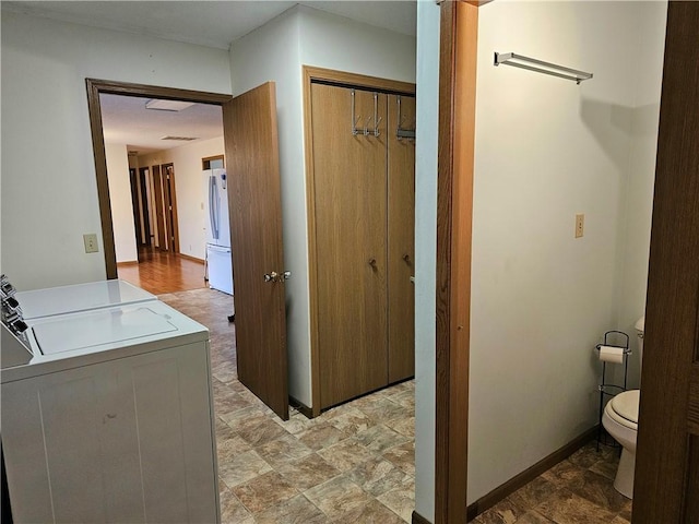 laundry area with independent washer and dryer