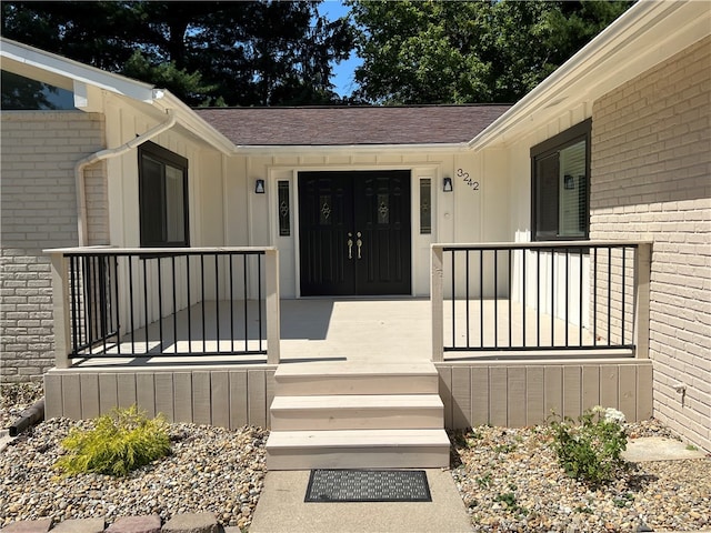 property entrance with a porch