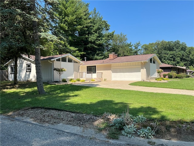 ranch-style house with a garage and a front lawn