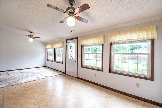 2008 Arthur Ave, Charleston, IL 61920 - entryway with a textured ceiling and ceiling fan