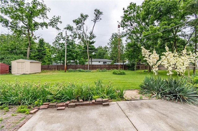 2008 Arthur Ave, Charleston, IL 61920 - view of yard featuring a shed and a patio area