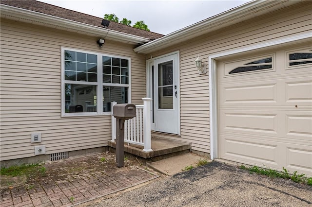 2008 Arthur Ave, Charleston, IL 61920 - entrance to property featuring a garage and crawl space