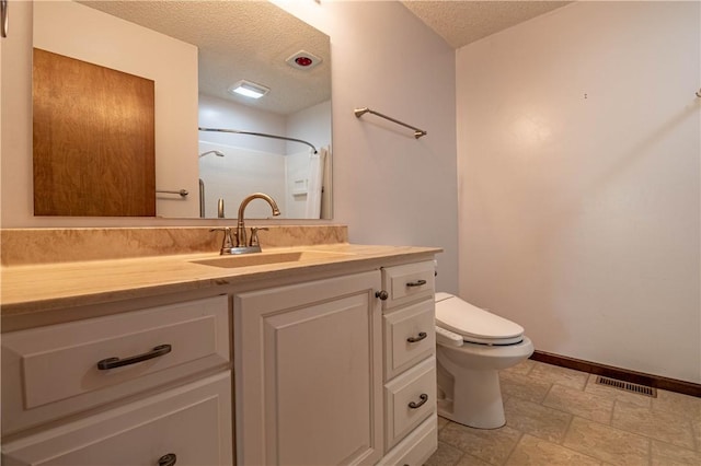 2008 Arthur Ave, Charleston, IL 61920 - full bath featuring a textured ceiling, vanity, a shower, and stone finish flooring