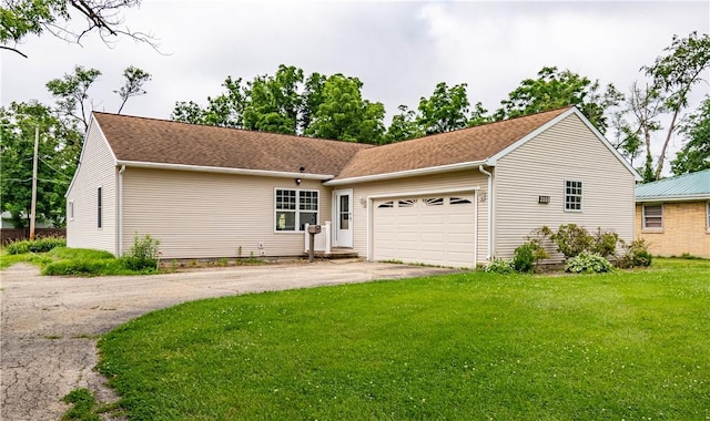 2008 Arthur Ave, Charleston, IL 61920 - single story home with driveway, a garage, and a front lawn