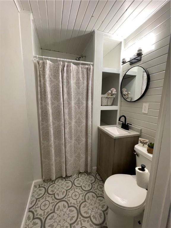 510 S 5th St, Marshall, IL 62441 - bathroom featuring vanity, wooden ceiling, and a shower with shower curtain
