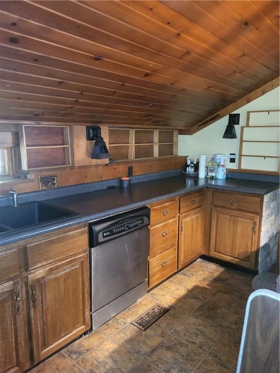 3848 Cahokia Ln, Charleston, IL 61920 - kitchen featuring stainless steel dishwasher, dark countertops, a sink, brown cabinets, and wood ceiling