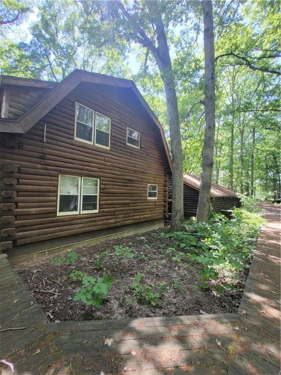 3848 Cahokia Ln, Charleston, IL 61920 - view of property exterior with log siding