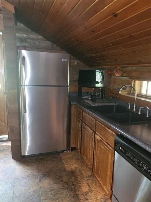 3848 Cahokia Ln, Charleston, IL 61920 - kitchen with appliances with stainless steel finishes, lofted ceiling, a sink, wood ceiling, and dark countertops
