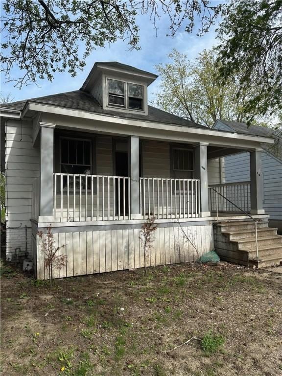 view of front of home featuring covered porch