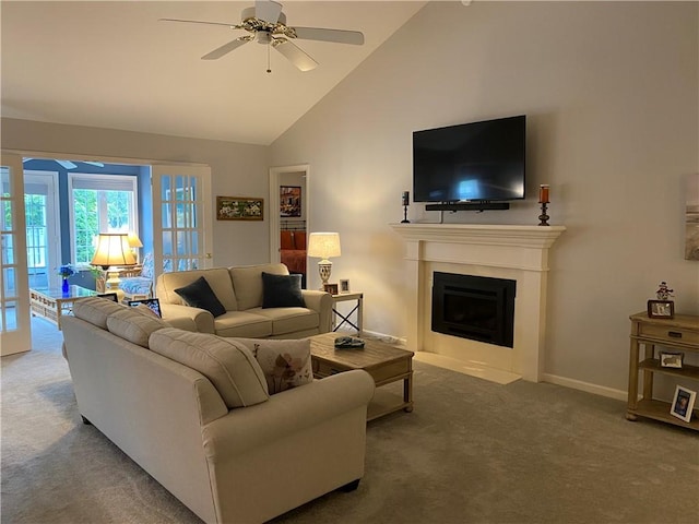 15 Fairfield Ln, Charleston, IL 61920 - carpeted living room with ceiling fan, a fireplace with flush hearth, high vaulted ceiling, and baseboards