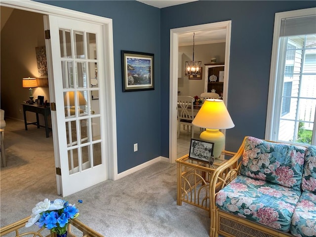 15 Fairfield Ln, Charleston, IL 61920 - sitting room featuring carpet floors, a chandelier, and baseboards