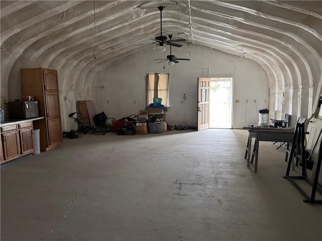 miscellaneous room featuring ceiling fan and vaulted ceiling