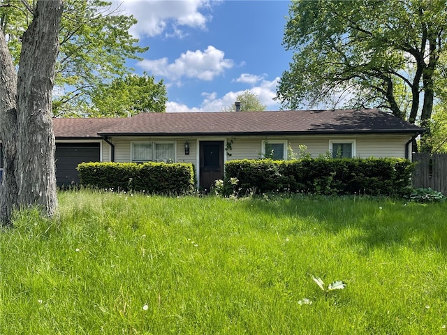 1205 Giddings St, Danville, IL 61832 - single story home with an attached garage and a shingled roof