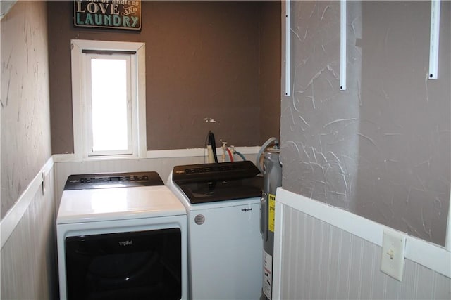 washroom featuring washer and clothes dryer