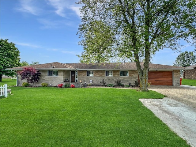 ranch-style home with stone siding, concrete driveway, a garage, and a front yard