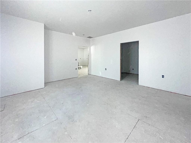 1100 Marshall Ave, Mattoon, IL 61938 - empty room with concrete floors