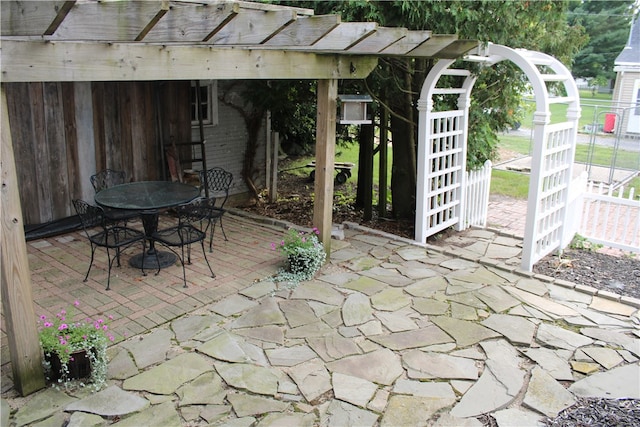 view of patio featuring a pergola